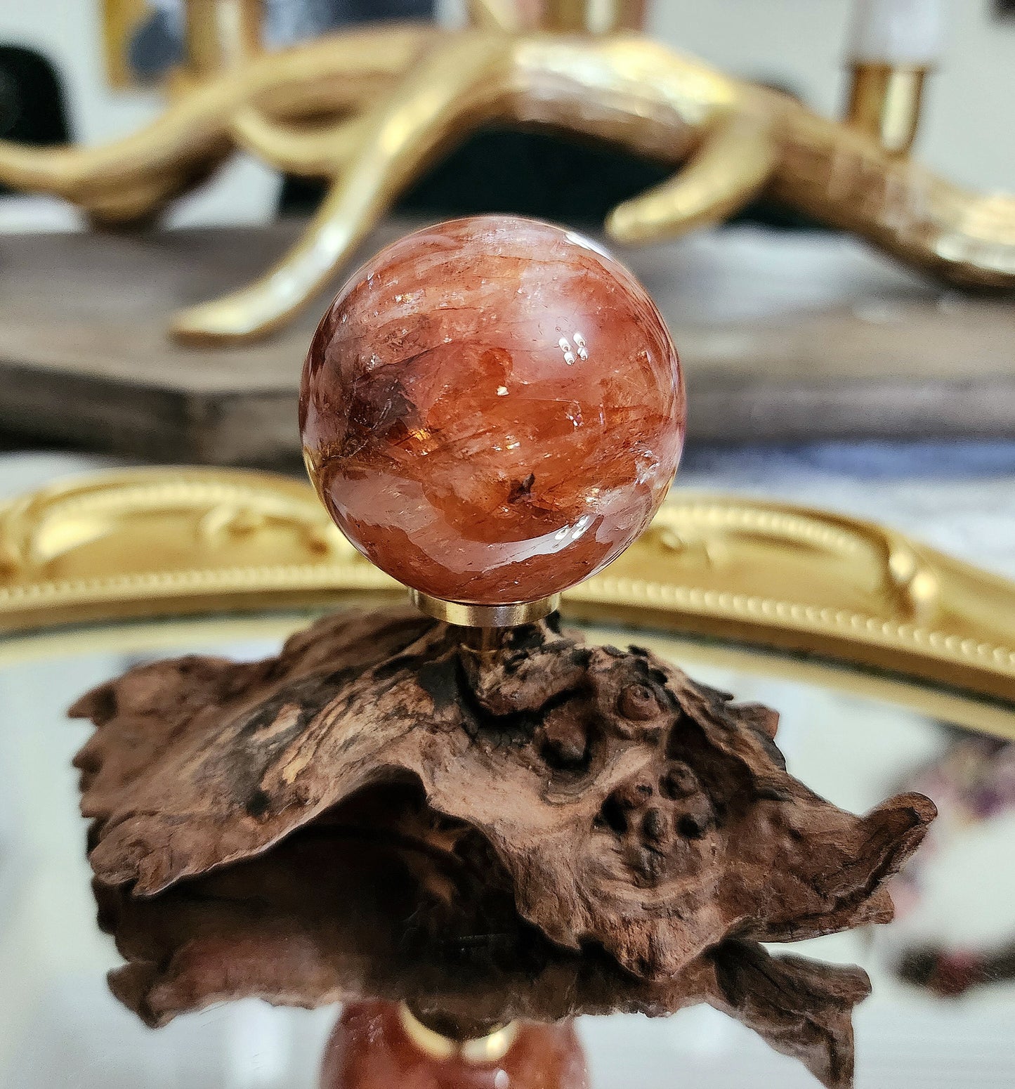 Fire Quartz Sphere on driftwood stand A