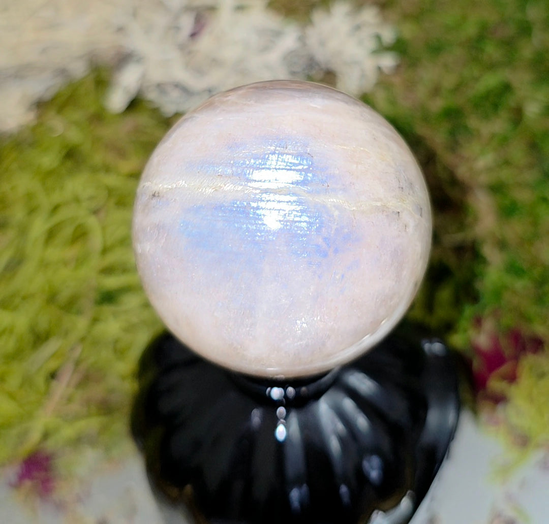 Moonstone Sphere on a Black Vase B