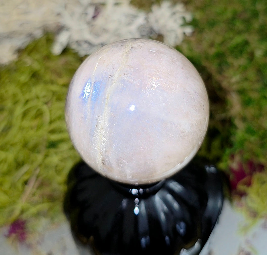 Moonstone Sphere on a Black Vase B