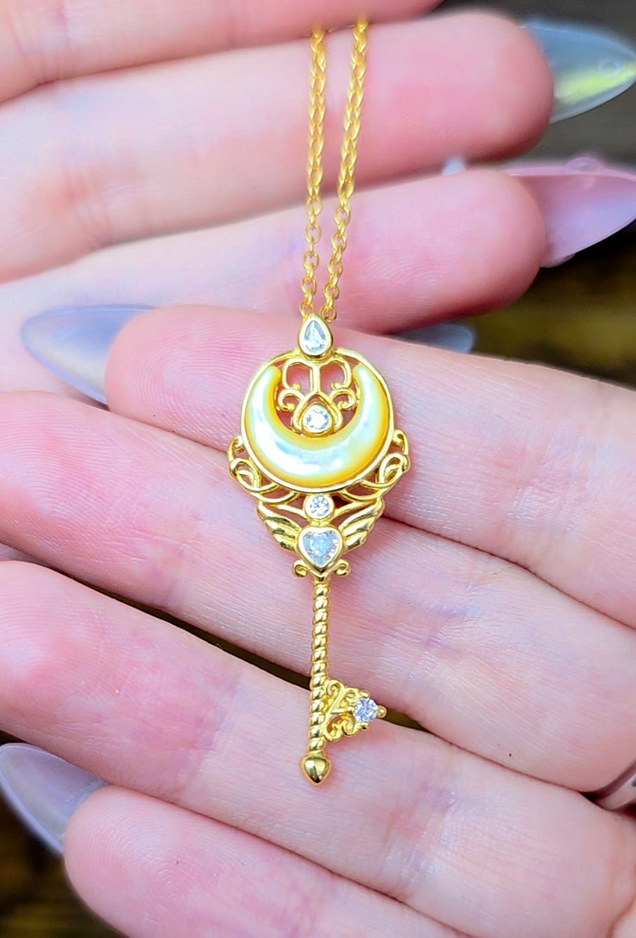 Golden Shell Moon Guardian Pendant