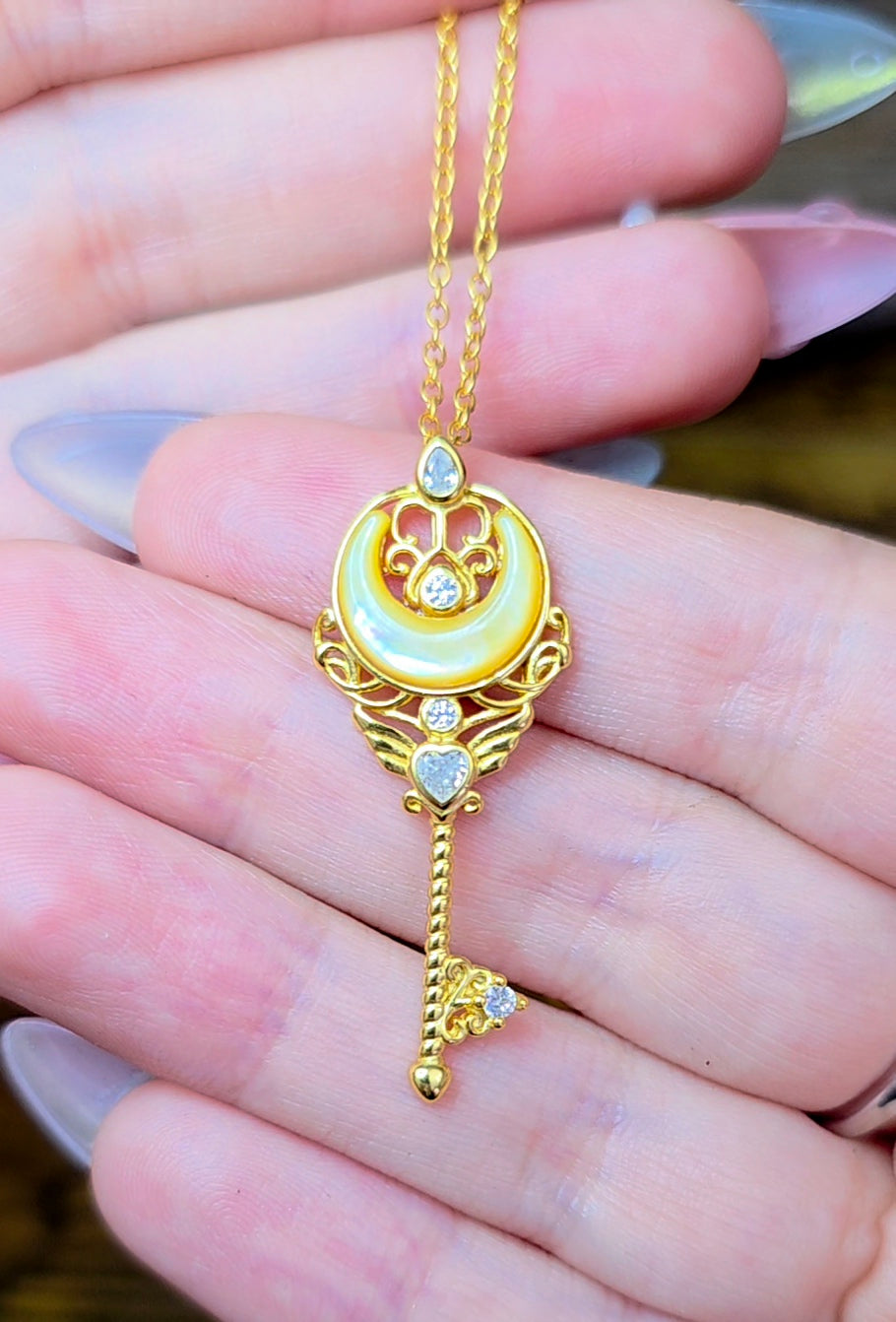 Golden Shell Moon Guardian Pendant