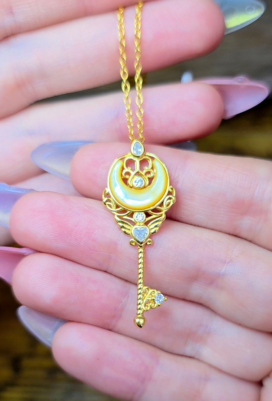Golden Shell Moon Guardian Pendant