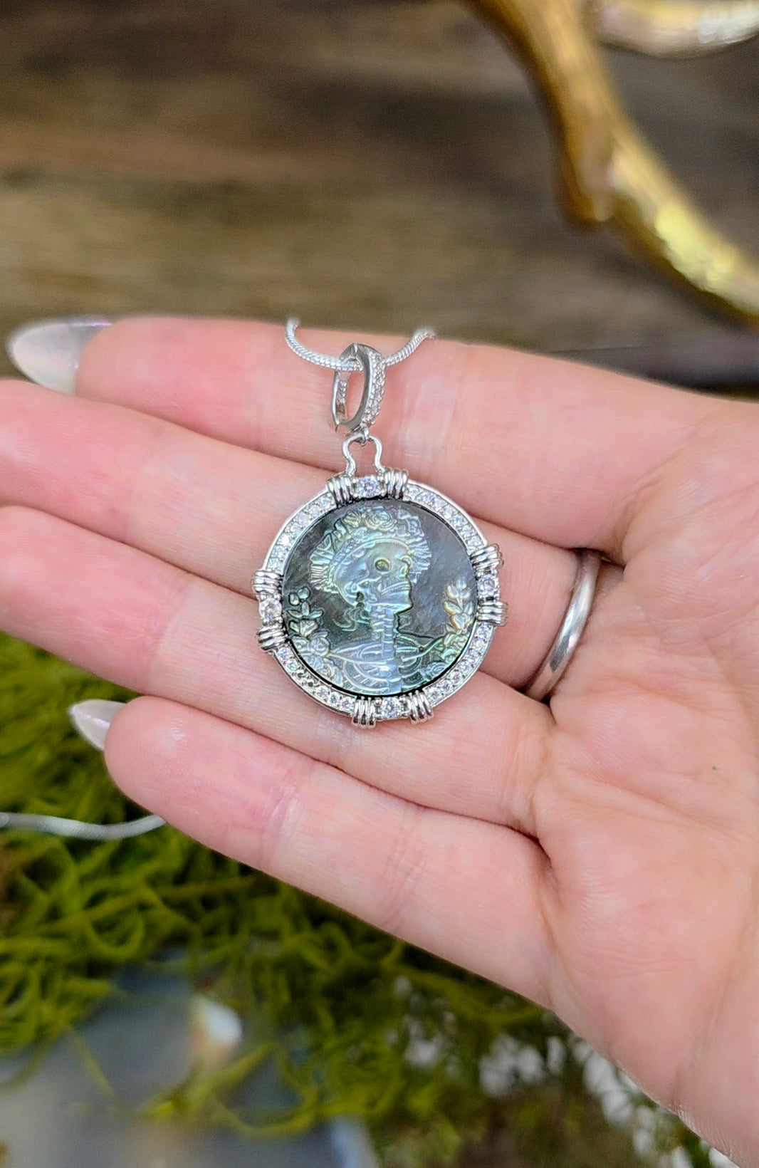 Black Shell Skeleton Pendant
