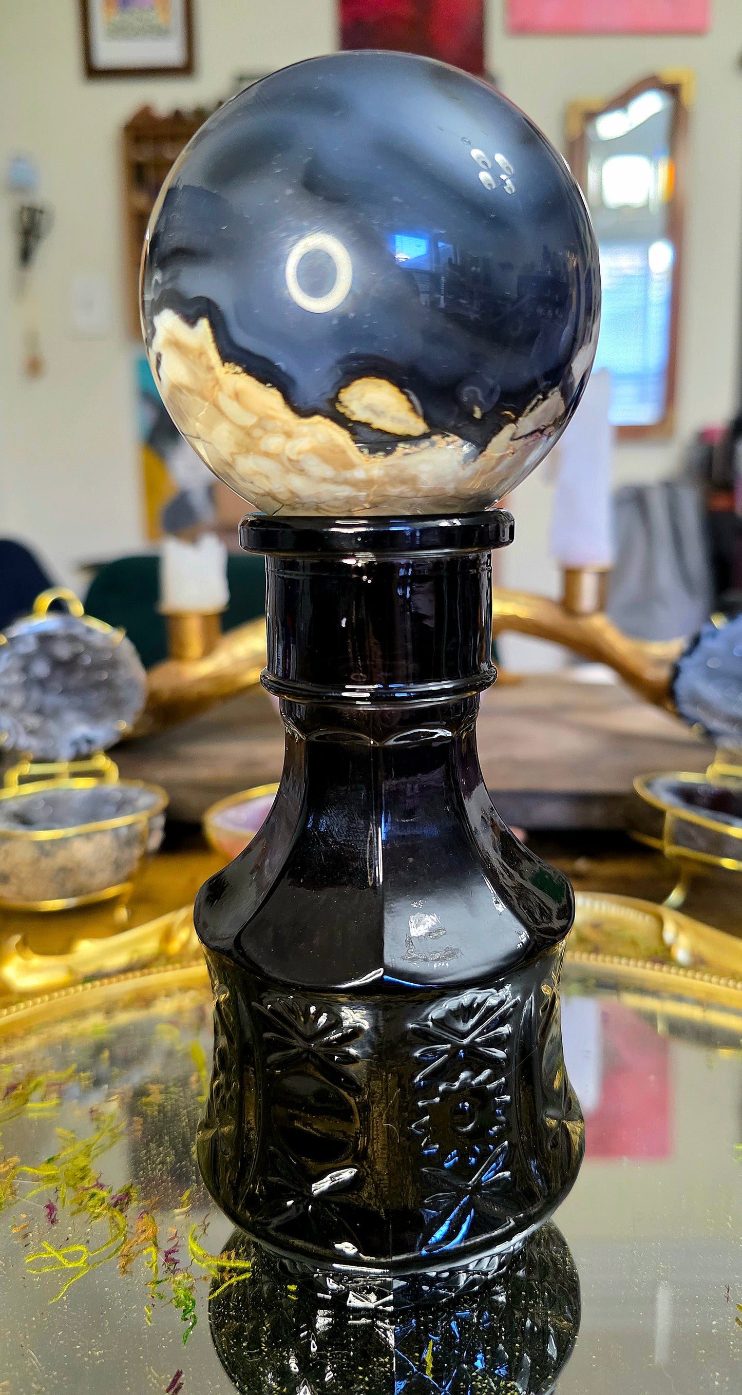 Volcano Agate Sphere on a Black Vase B