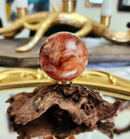 Fire Quartz Sphere on driftwood stand A