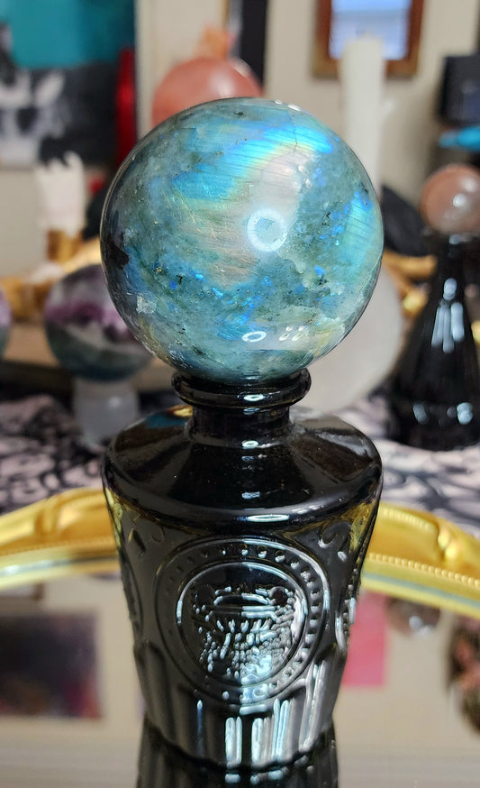 Rainbow Flash Labradorite Sphere on Glass Vase