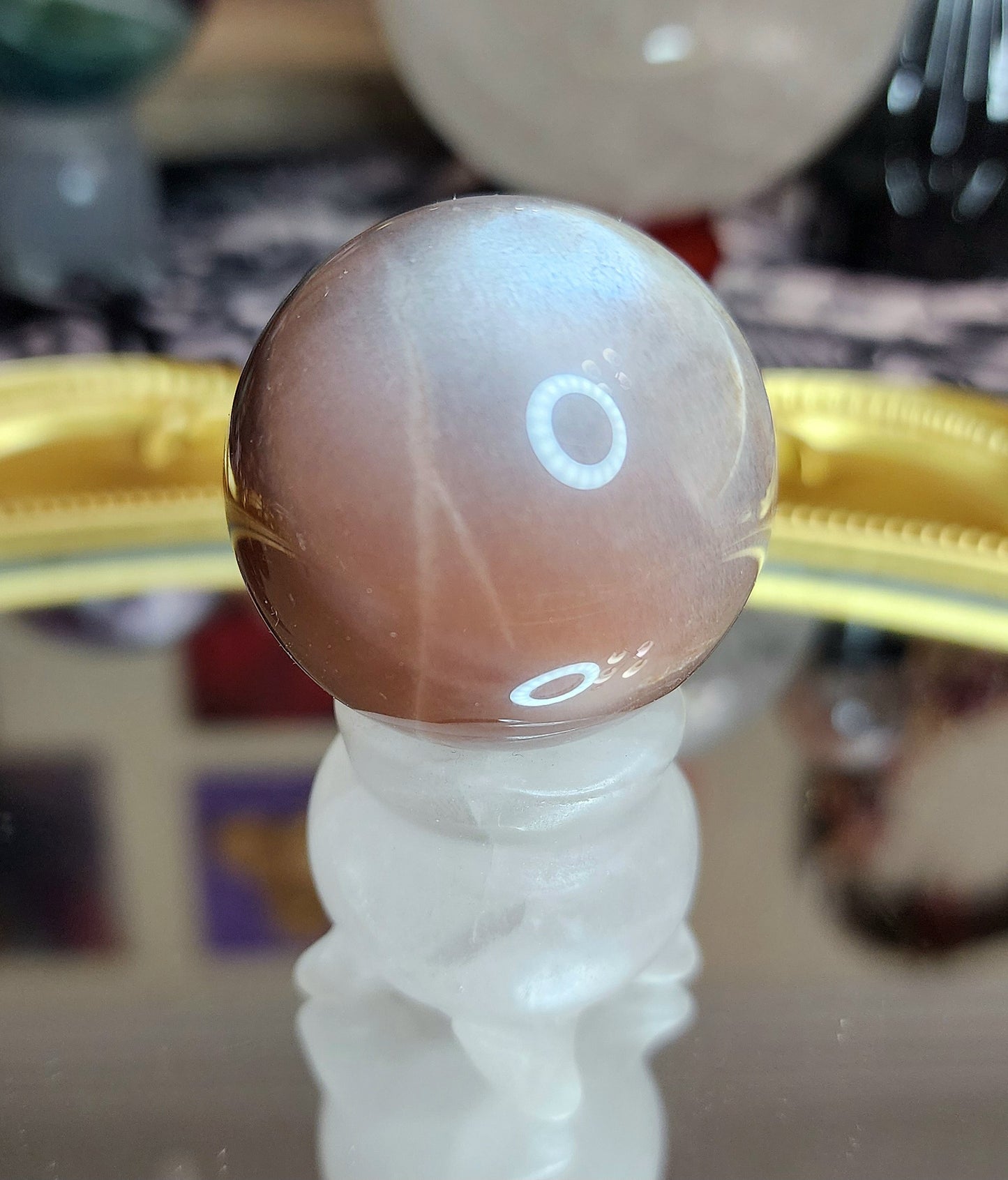 Black Sunstone Sphere on a Rose Quartz Cauldron