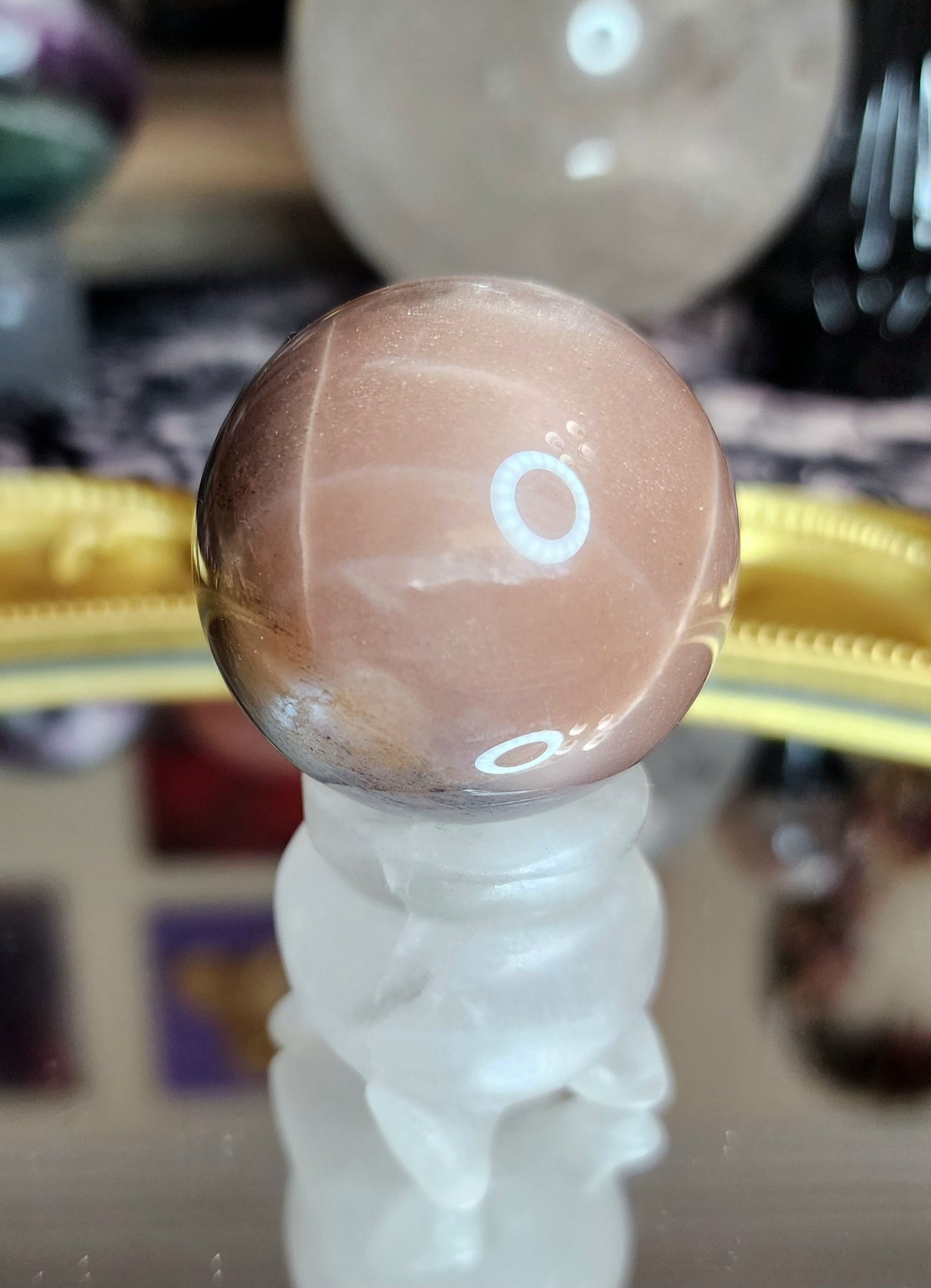 Black Sunstone Sphere on a Rose Quartz Cauldron