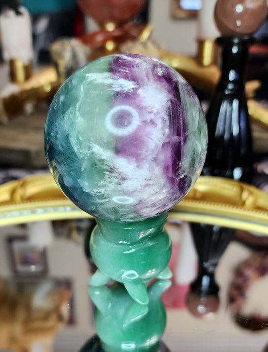 Feather Fluorite Sphere on a Cauldron A