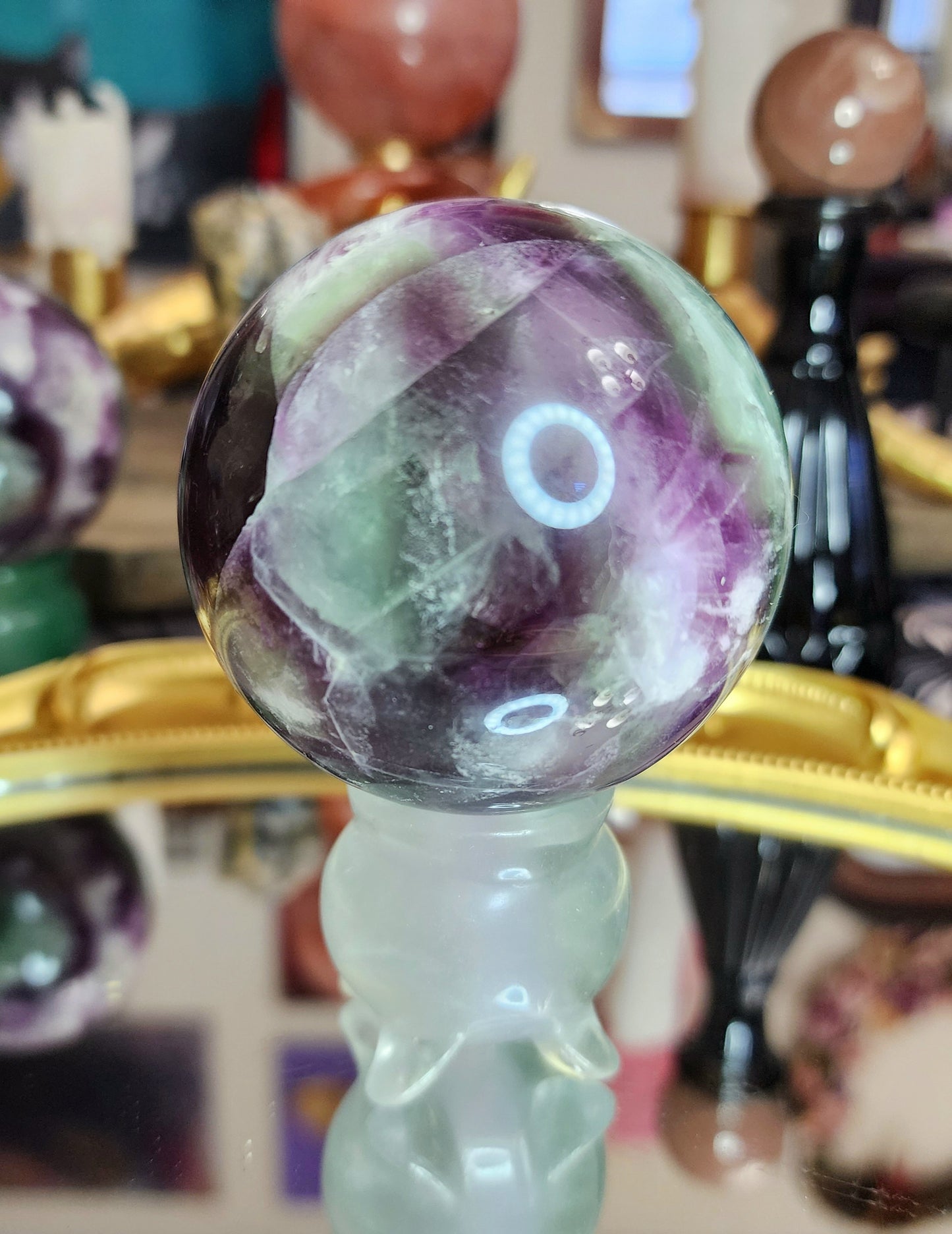 Feather Fluorite Sphere on a Cauldron B