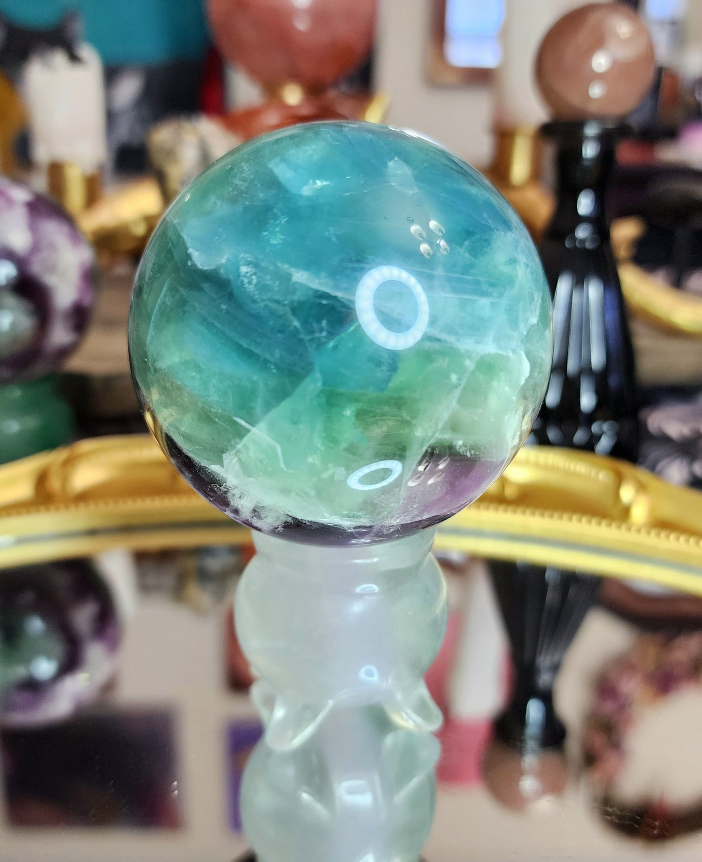 Feather Fluorite Sphere on a Cauldron B