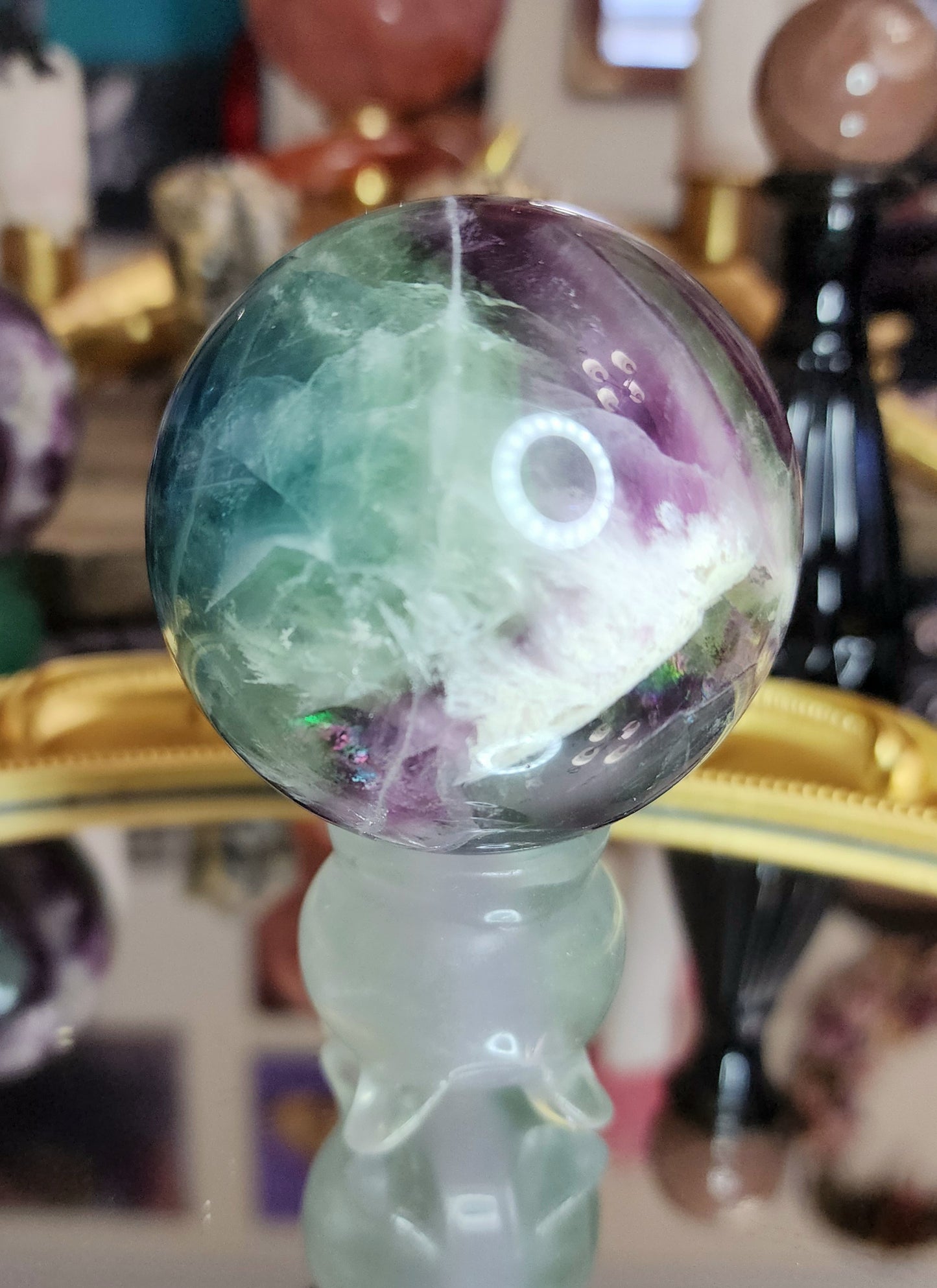 Feather Fluorite Sphere on a Cauldron B