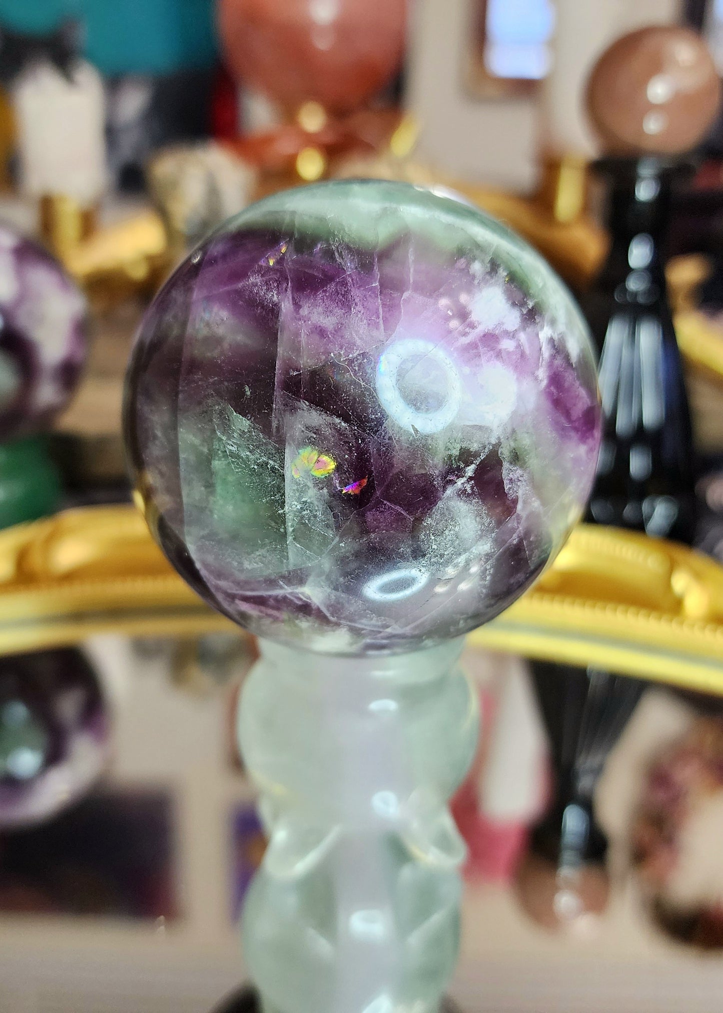 Feather Fluorite Sphere on a Cauldron B