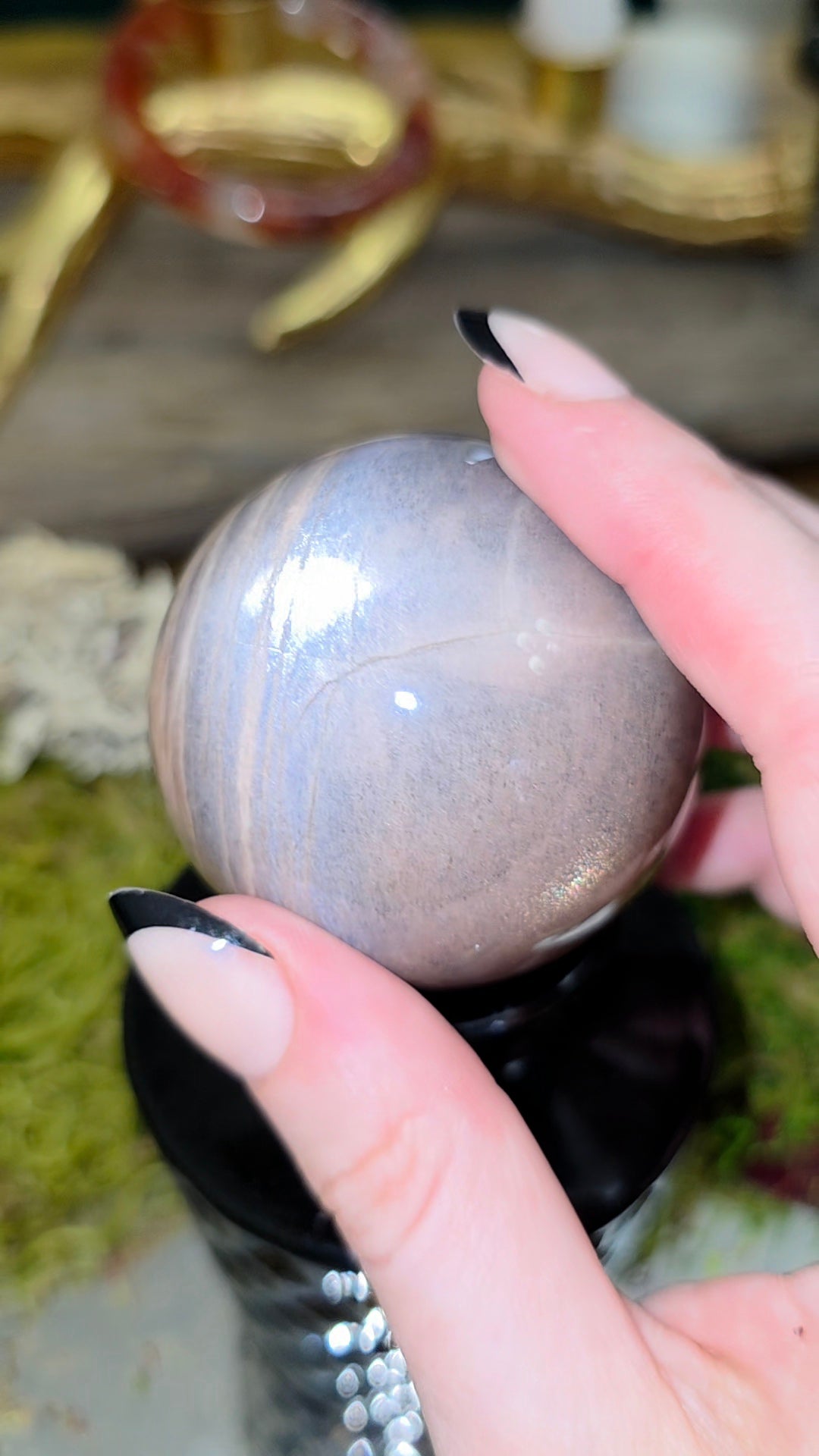 Black Sunstone Sphere on a Black Vase B