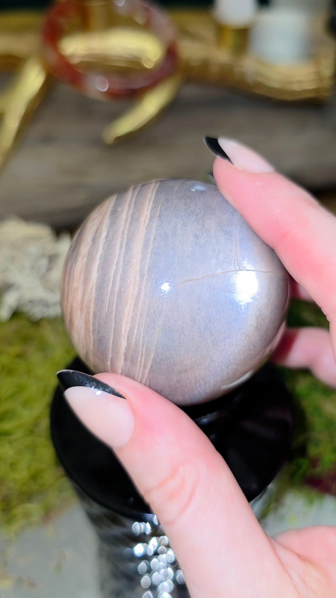 Black Sunstone Sphere on a Black Vase B