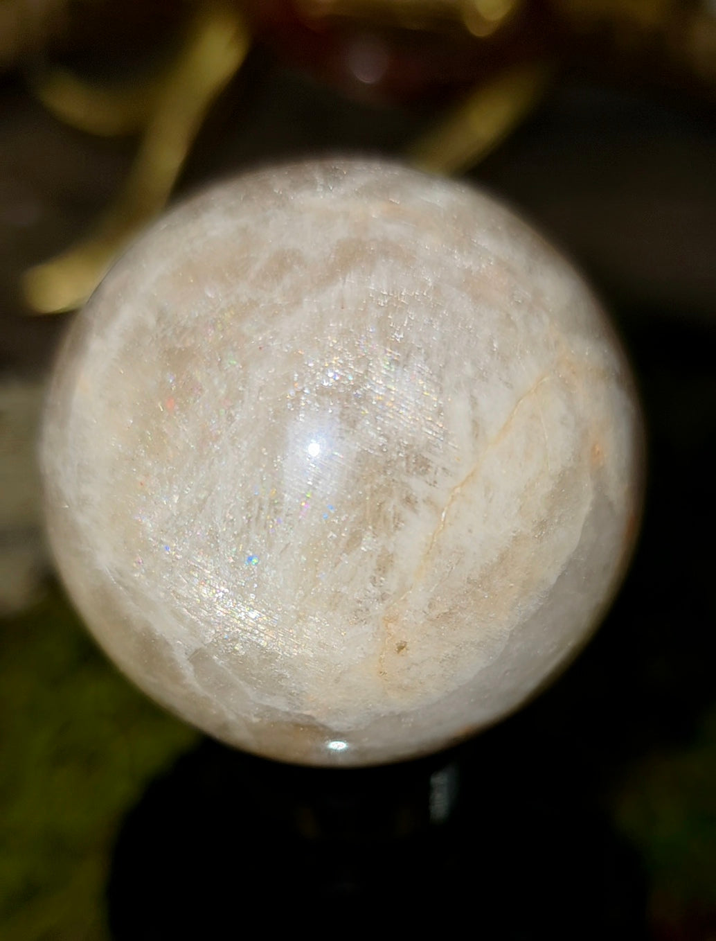 Moonstone Sphere on a Black Vase C