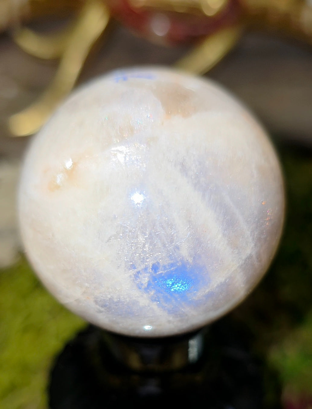 Moonstone Sphere on a Black Vase C