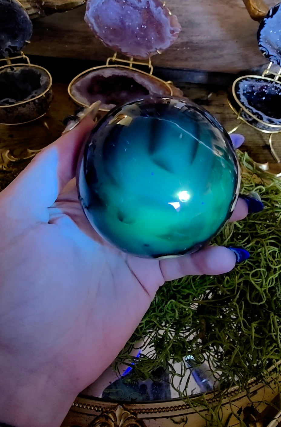 Volcano Agate Sphere on a Black Vase B