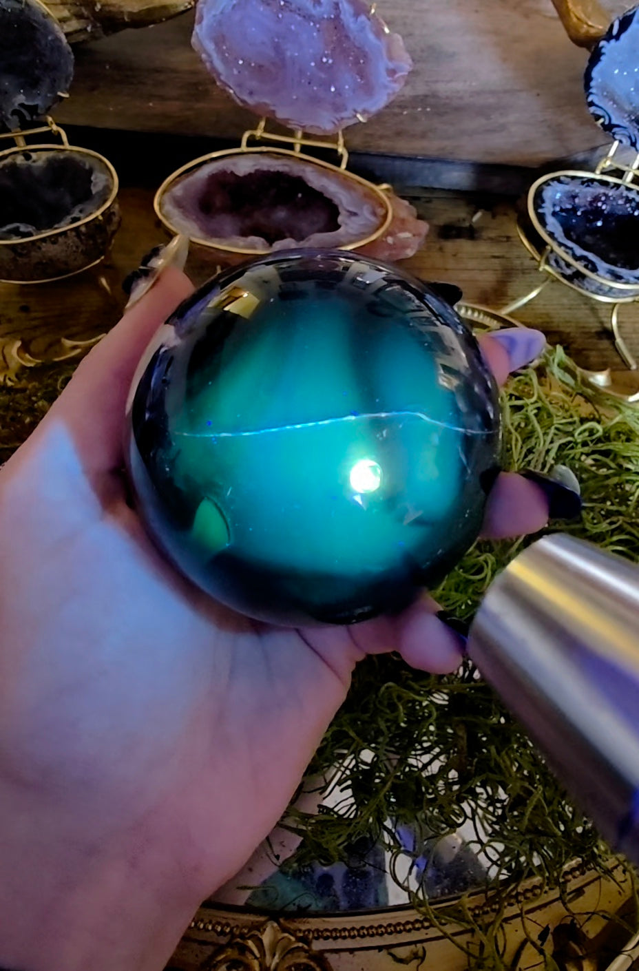 Volcano Agate Sphere on a Black Vase B