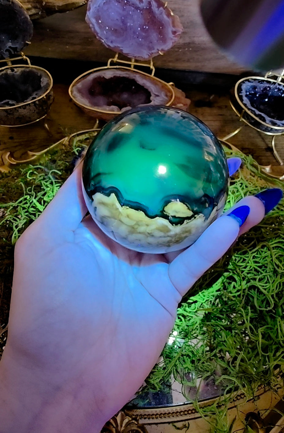 Volcano Agate Sphere on a Black Vase B