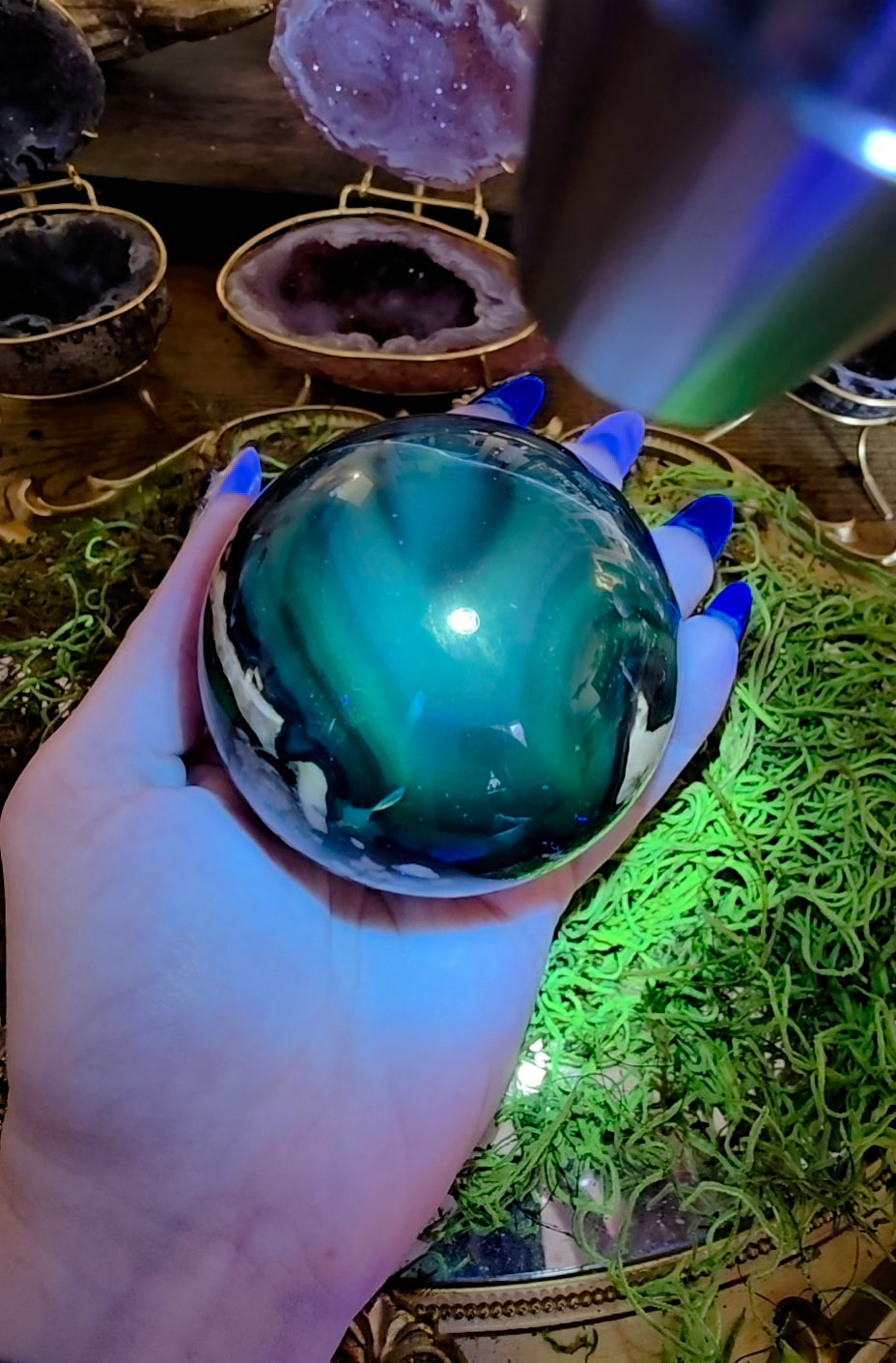 Volcano Agate Sphere on a Black Vase B
