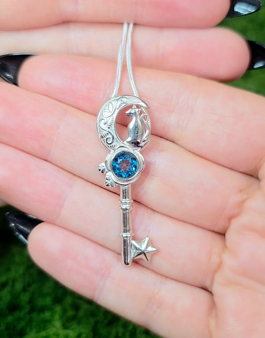 Blue Topaz Key Pendant