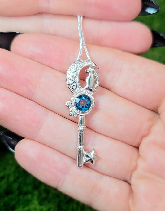 Blue Topaz Key Pendant
