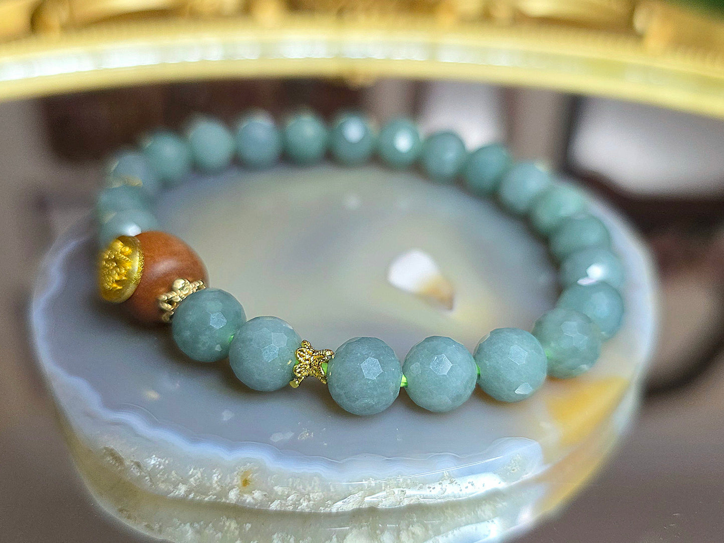 Jadeite and Wood Stretch Taotie Mask Bracelet