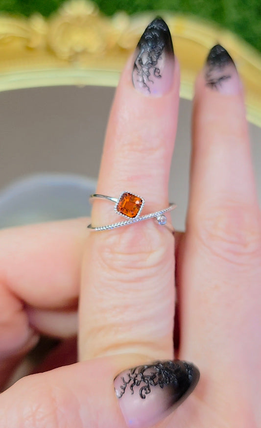 Fanta Garnet Infinity Ring