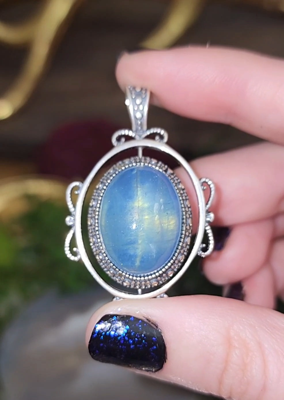 Spinning Aquamarine Pendant