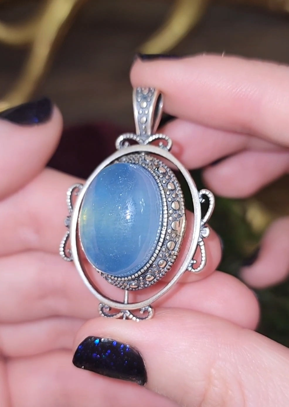 Spinning Aquamarine Pendant