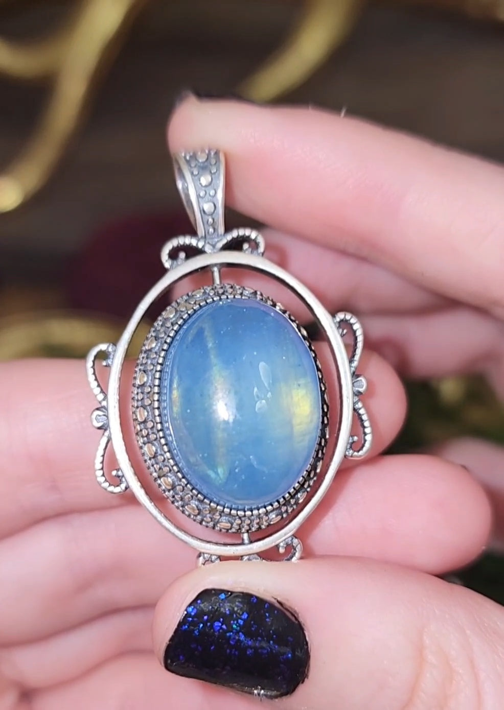 Spinning Aquamarine Pendant