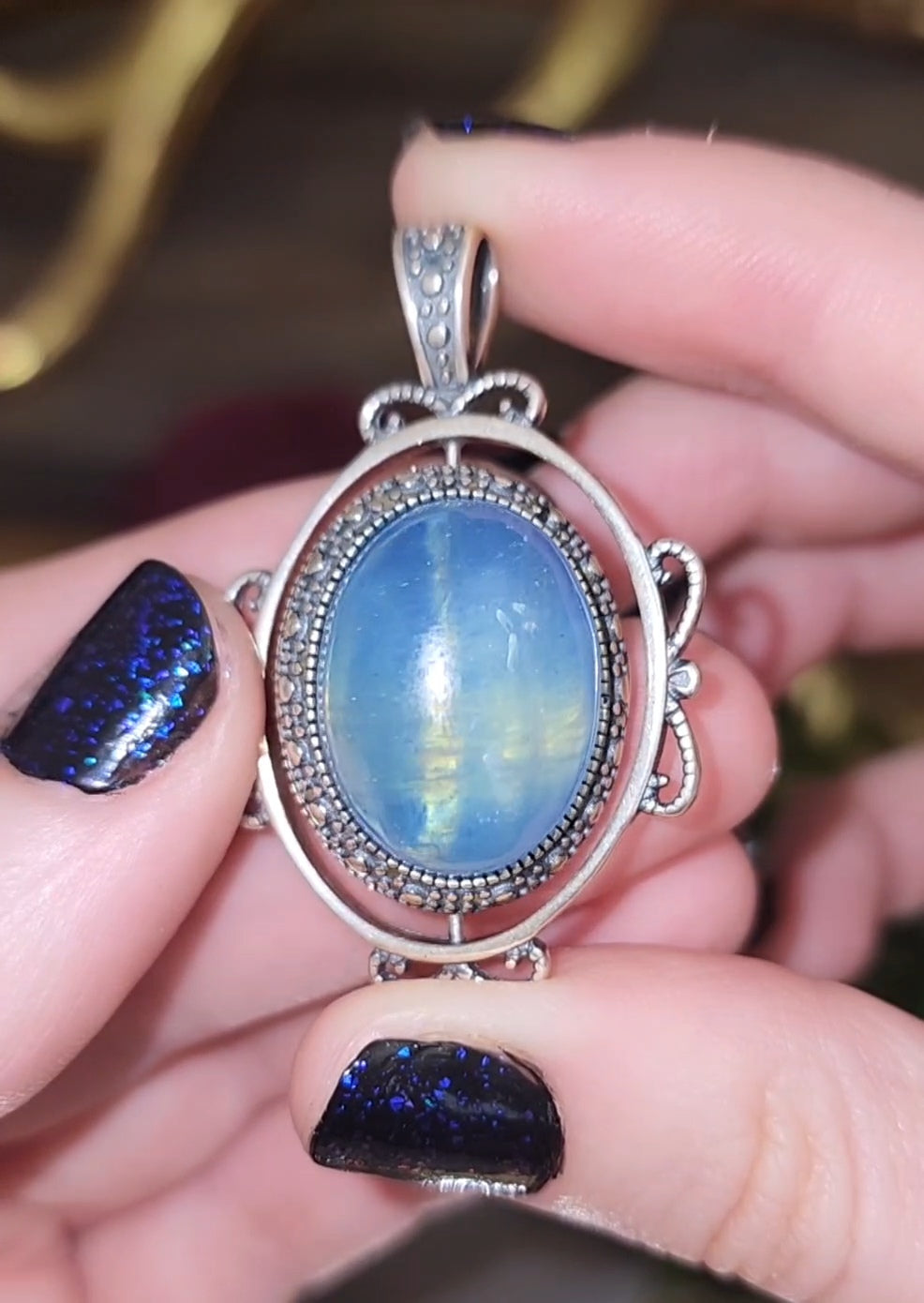 Spinning Aquamarine Pendant