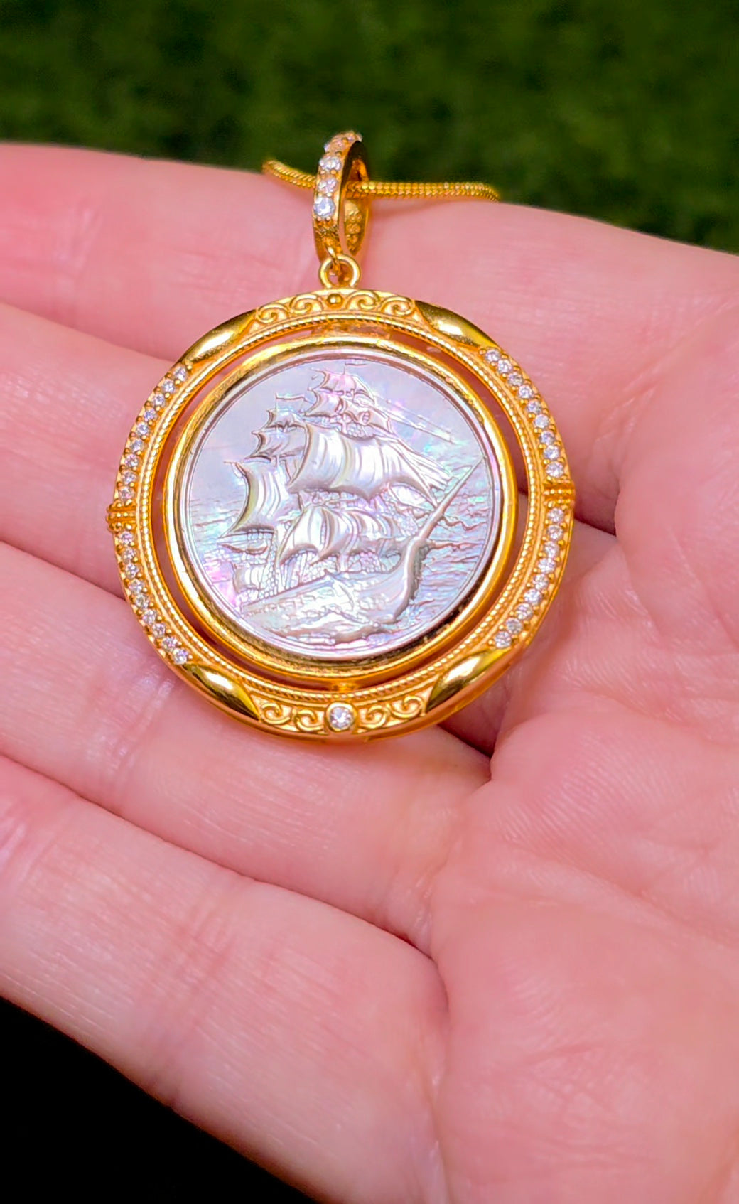 Rotating Black Shell Ship and Compass Pendant
