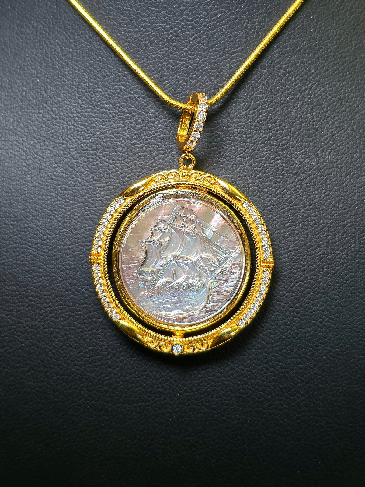 Rotating Black Shell Ship and Compass Pendant