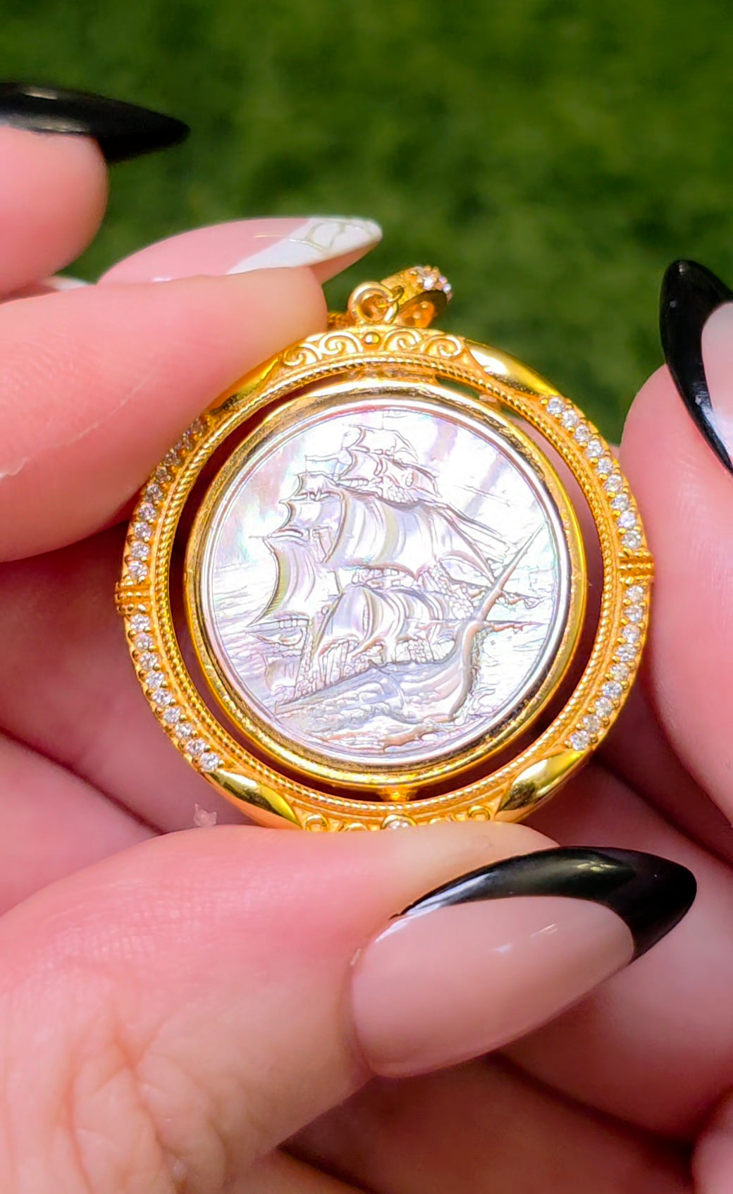 Rotating Black Shell Ship and Compass Pendant